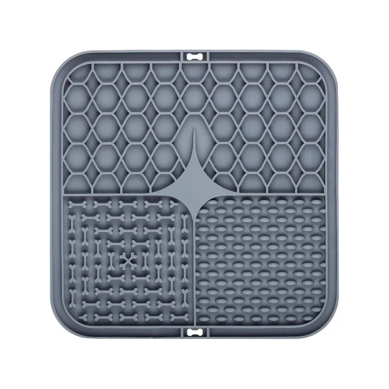 Gray silicone lick mat for dog bathing and slow food training with divided sections