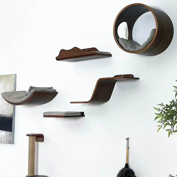 Wall-mounted cat tree featuring a wooden scratching post, stairs, and hammock mounted on a white wall.