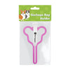 A clear plastic package containing a pink garbage bag holder for dog waste bags.