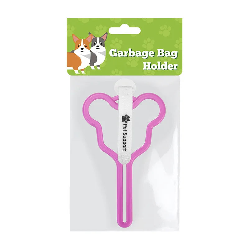 A clear plastic package containing a pink garbage bag holder for dog waste bags.