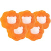 Several orange, porous balls designed for reusable pet hair and lint removal.