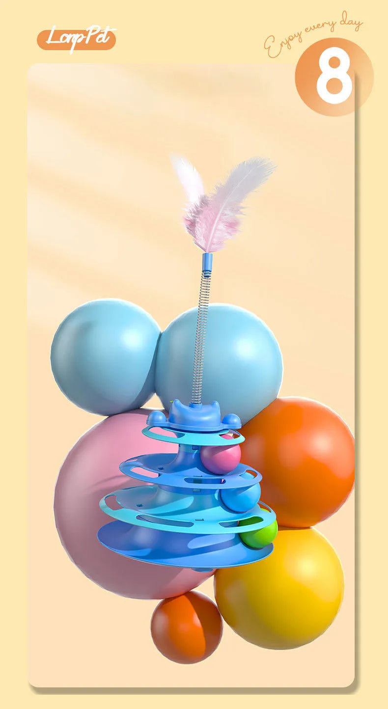 A colorful interactive cat turntable toy featuring rolling balls and a feather wand.