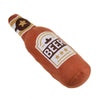 A plush toy shaped like a beer bottle with a dog theme, featuring brown and gold accents.