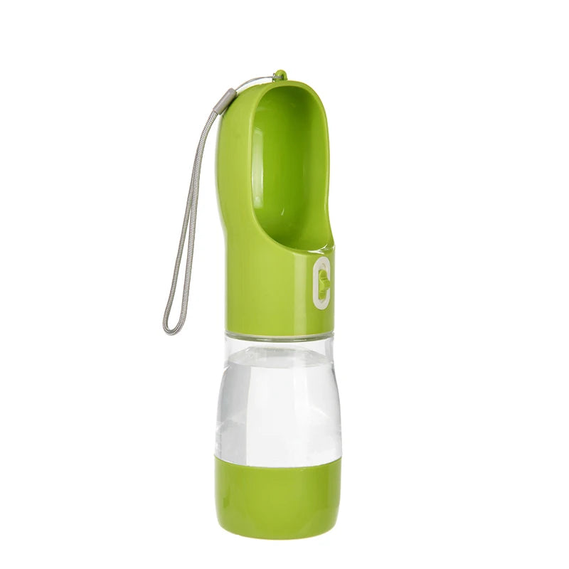 A lime green portable 2-in-1 dog water bottle and food dispenser with a flexible tube.