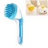 A blue silicone pet bath brush with a shampoo dispenser is shown, along with close-ups of it being used on a white pet.