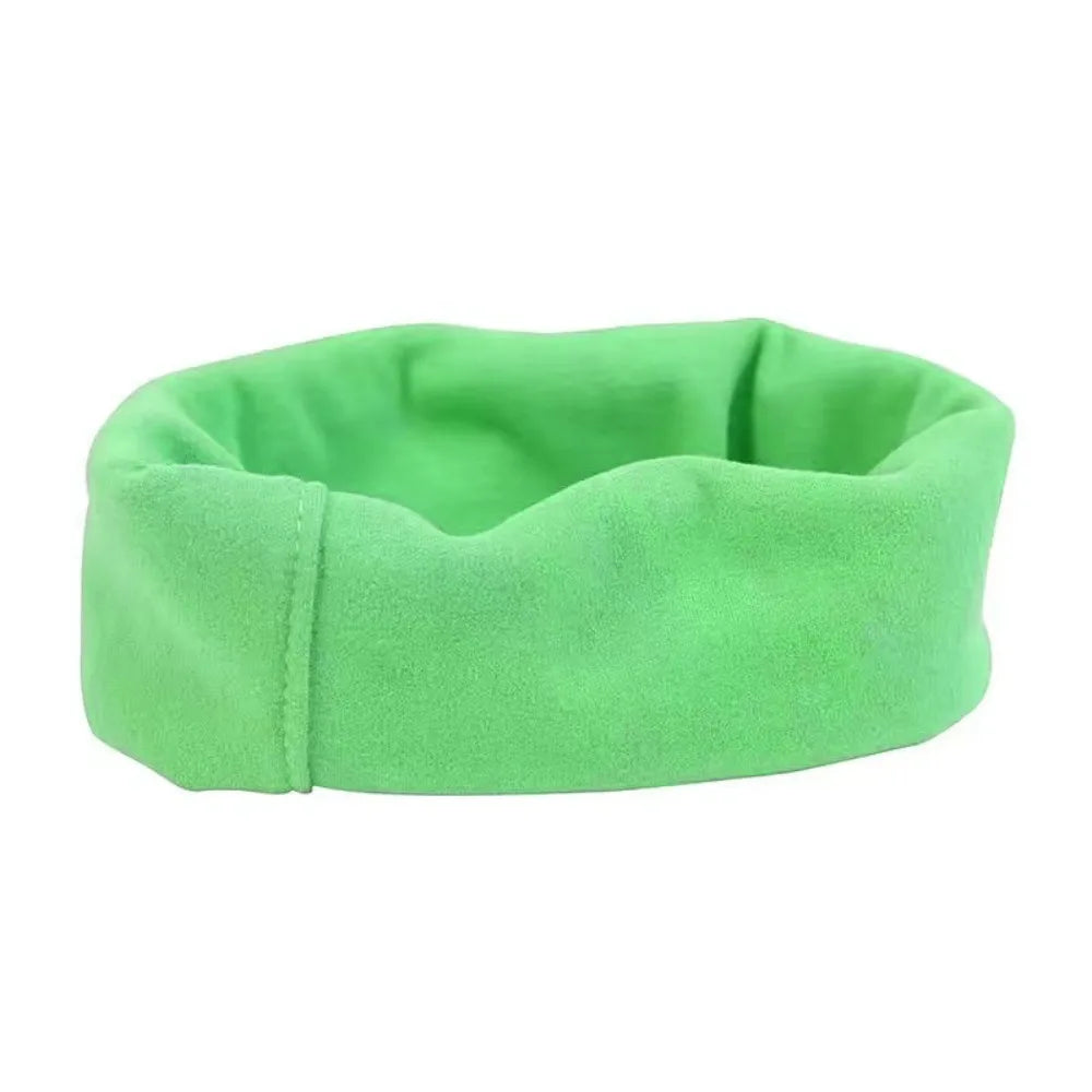 A bright green soundproof pet ear muff designed for comfort and noise reduction.