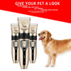 Three professional pet hair clippers in gold and black are shown next to a happy dog.