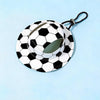 A black and white soccer ball print bucket hat with a black strap, shown against a light blue background.