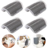 A set of gray silicone pet grooming combs and scratchers shown in various angles with a cat.