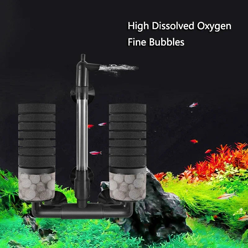 A black aquarium bio sponge filter with fine bubbles is shown in a natural aquatic environment.