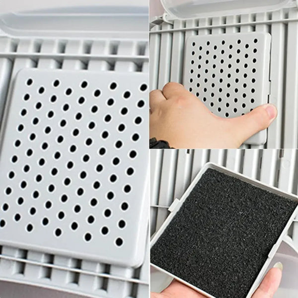 Close-up view of activated carbon filter pads for cat litter boxes being placed into a plastic tray.
