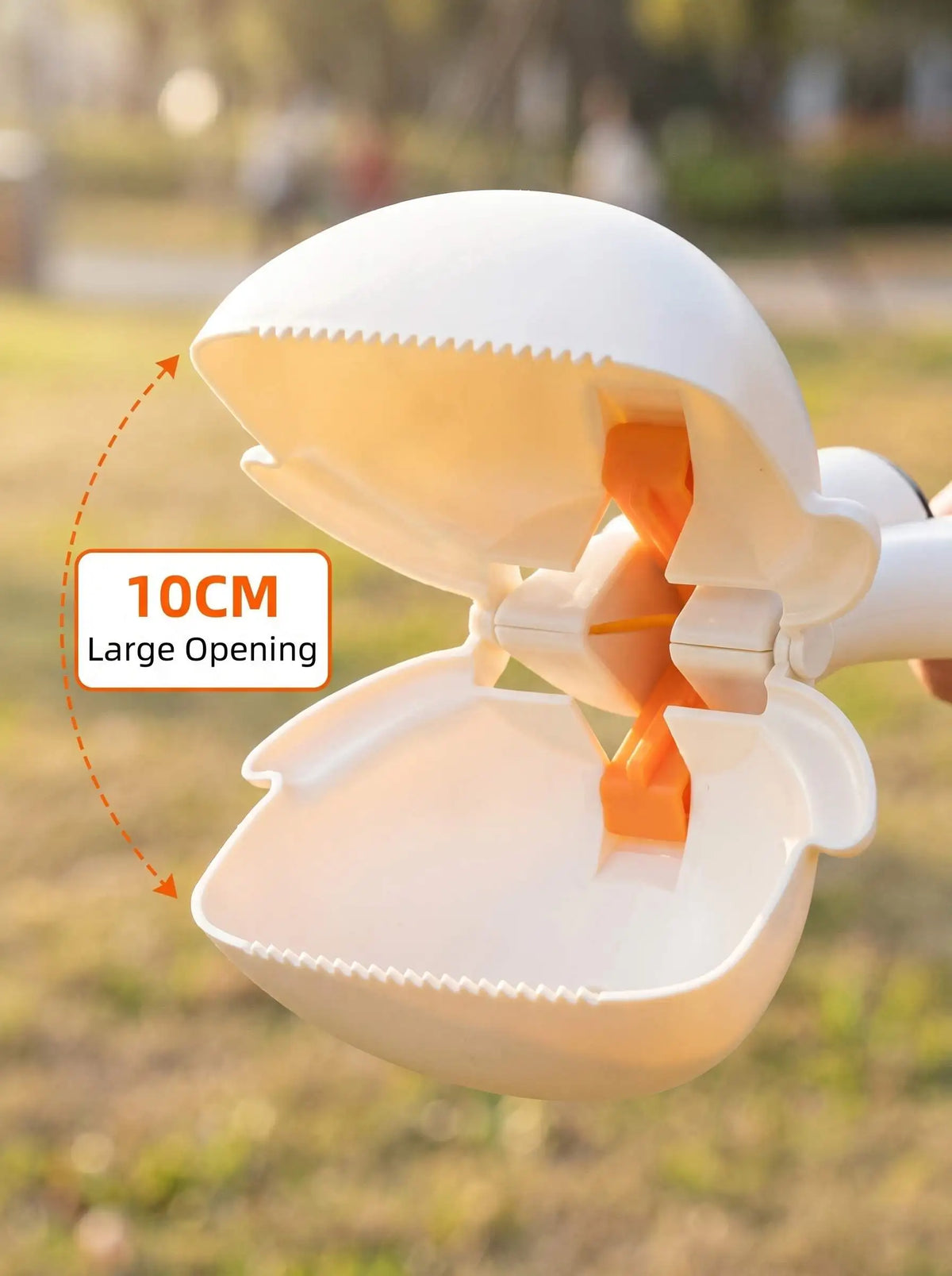 A white portable pet poop picker scooper is shown open, demonstrating a 10cm large opening.