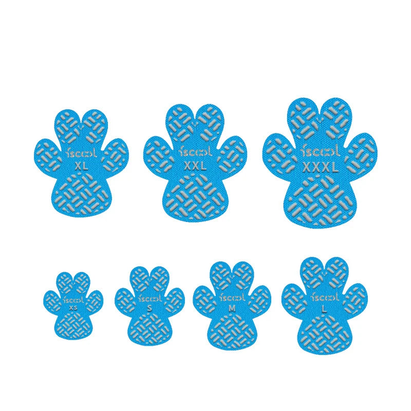 A pack of four blue anti-slip dog paw grips labeled XL, XXL, XXXL, and L.