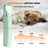 A light green electronic pet grooming device is shown next to a dog sleeping on white bedding, demonstrating low frequency an