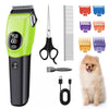 A professional pet hair clipper in lime green and black with various attachments and a fluffy dog.
