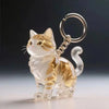 Figurine de chat en résine avec accents dorés, attachée à une clé en argent.