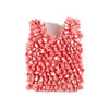A close-up of a reusable foldable bubble shopping bag made of ruffled pink fabric.