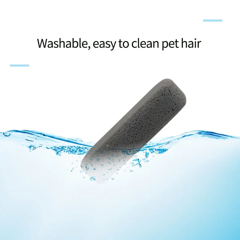 A gray pumice pet hair remover brush submerged in clear water.