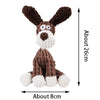 A brown and white plush toy of a donkey dog with large ears and a fluffy body.