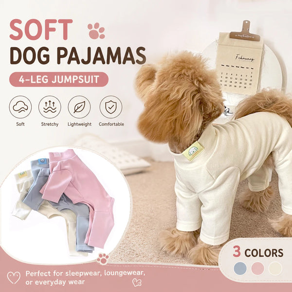 A fluffy dog is wearing a light beige soft stretch four-leg jumpsuit pajama set.