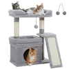 A gray cat tree with sisal scratching posts and cozy perches, featuring a perch for a cat to rest.