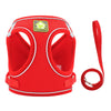 Red adjustable mesh dog harness with reflective strips and a detachable leash