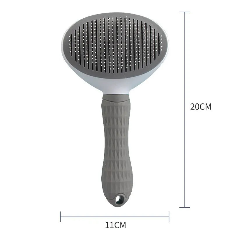 A gray pet hair removal brush with massage pins shown vertically.