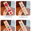 Four sets of adorable flower-shaped baby hair clips are displayed on a card, featuring various colors and designs.