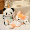 A white and black panda plush toy and an orange fox plush toy are displayed in a light-colored bag.