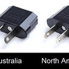 Four versions of an ultra-quiet submersible water pump for aquariums and ponds, labeled European, Australia, North America, a