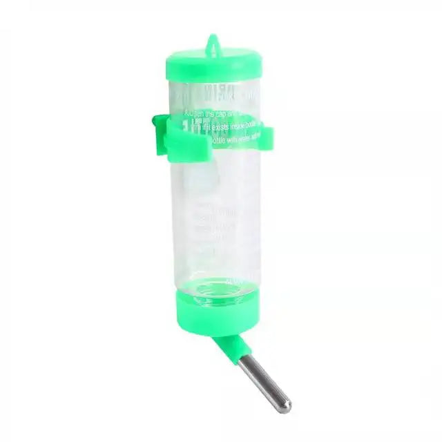 A clear plastic hanging drinker bottle with a green cap and a metal hook.