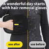 A hand is removing pet hair from a black garment using a black silicone glove for hair removal.