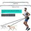 A person is holding a reflective dog leash with a storage bag, demonstrating its use with a dog.