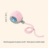 Pink automatic electric cat ball toy with a flexible cord and a clear ball component.