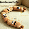A plush sausage dog toy made of brown fabric with embroidered features and sound-making sections.