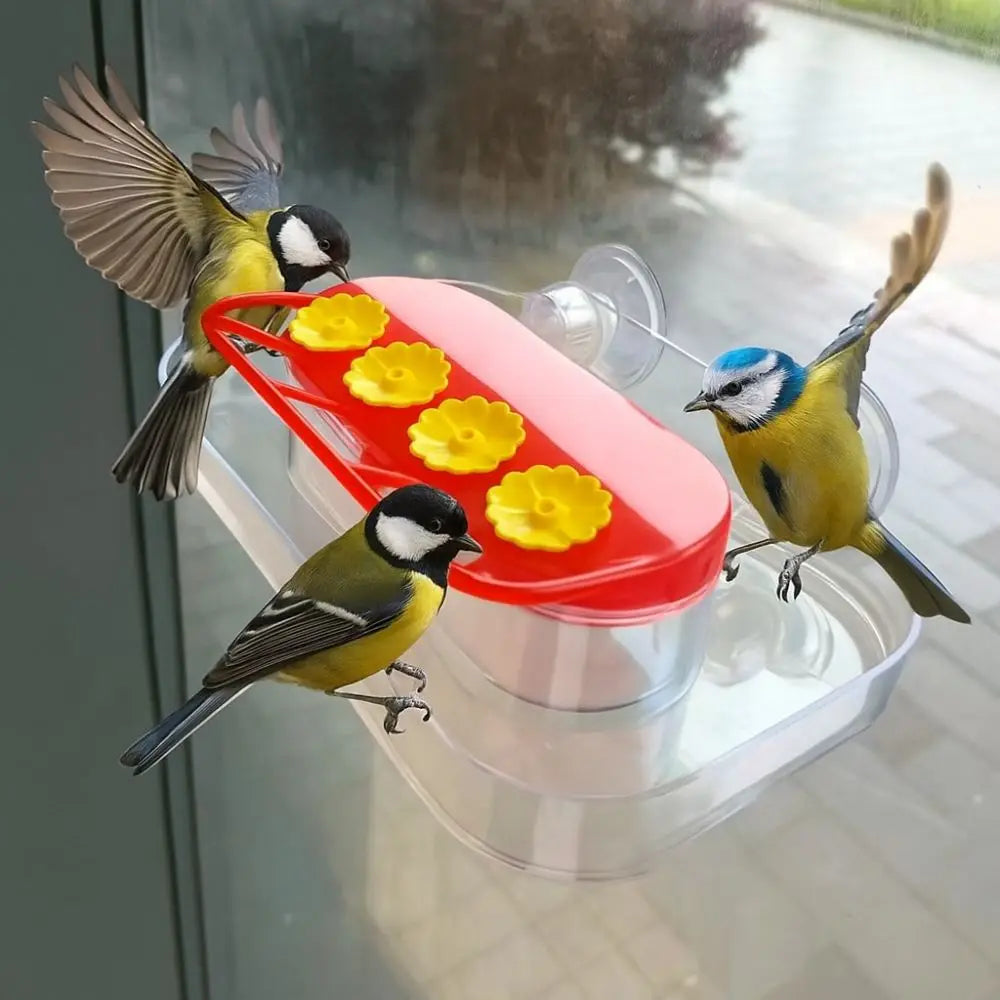 A suction cup hummingbird feeder with a transparent reservoir filled with yellow nectar, featuring several hummingbirds.