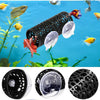 Black aquarium hideout tube with suction cups for betta and small fish shown against a blue aquatic background