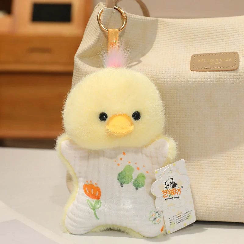 A yellow cartoon duck bean bag plush toy with pink accents resting on a beige canvas bag.