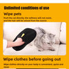 A hand is using a black reusable pet grooming glove to wipe a cat's fur.