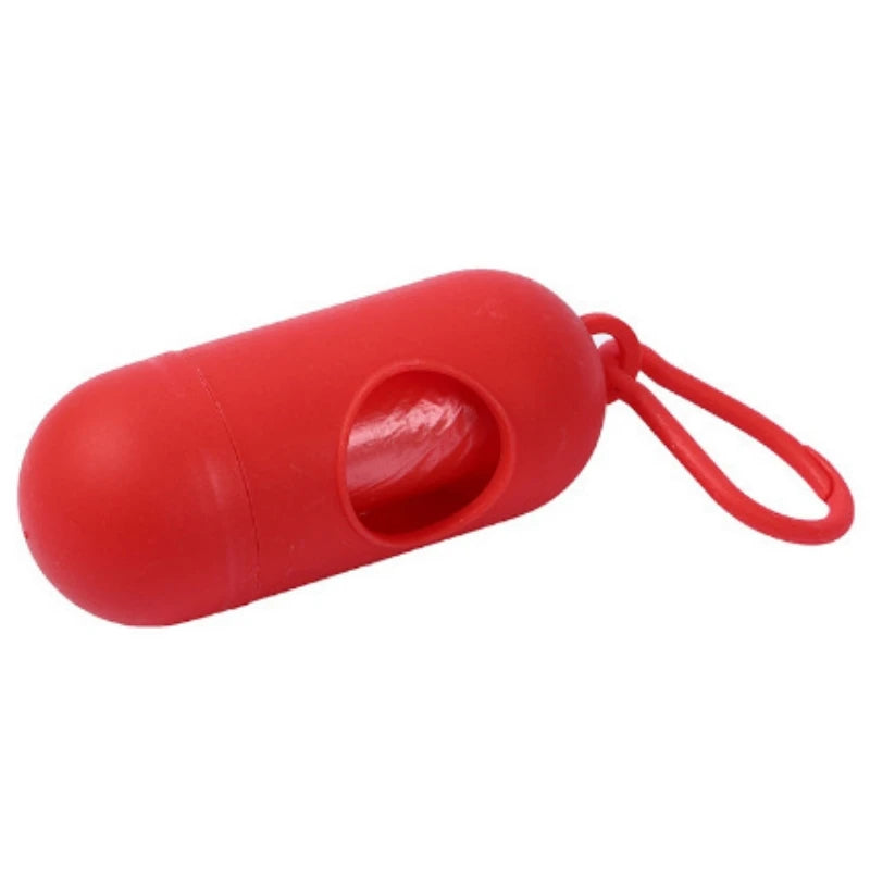 Red capsule-shaped dog poop bag dispenser with a carabiner clip.