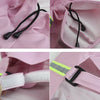 Close-up views of a pink waterproof reflective dog raincoat showing adjustable drawstrings and a snap closure detail.