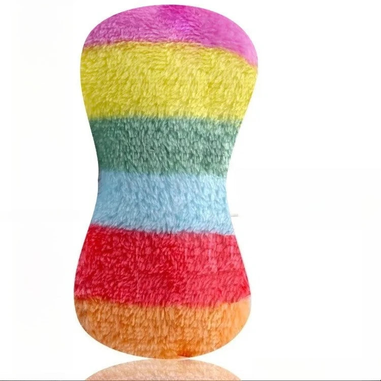 A striped plush dog toy featuring horizontal bands of pink, yellow, green, blue, and red.