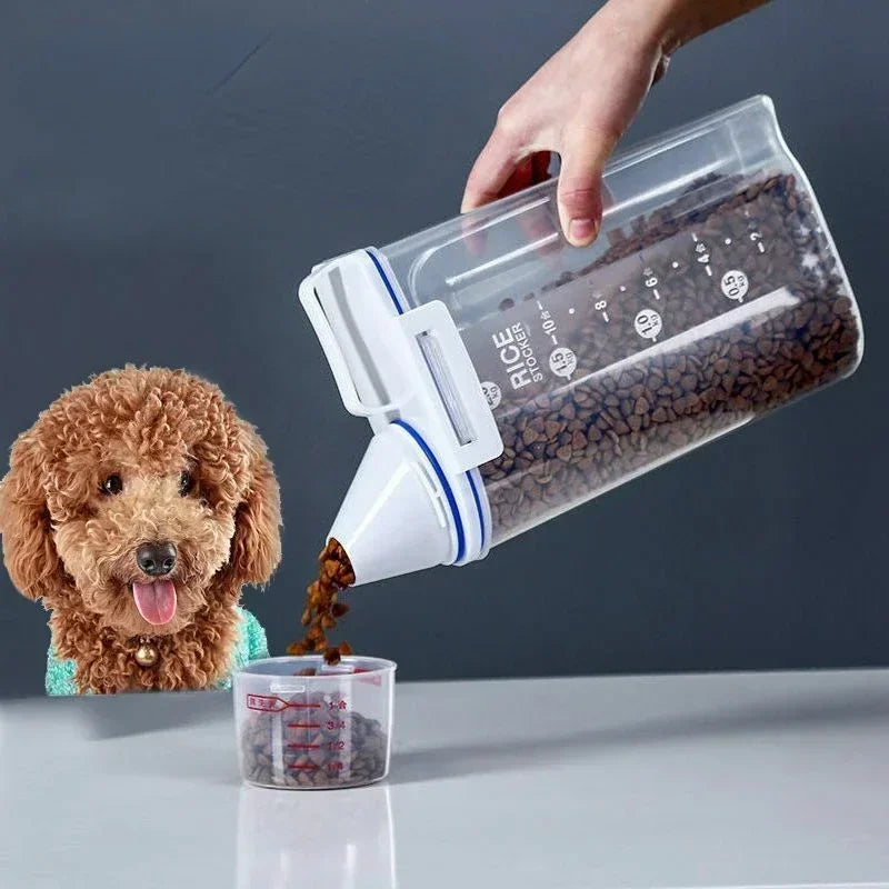 A hand pours dry rice pet food from an airtight storage container into a small measuring cup.