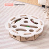 A white, flower-shaped puzzle toy for cats with multiple holes and wooden sticks for indoor play.