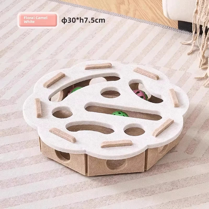A white, flower-shaped puzzle toy for cats with multiple holes and wooden sticks for indoor play.