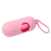 Pink capsule-shaped dog poop bag dispenser with a carabiner clip.