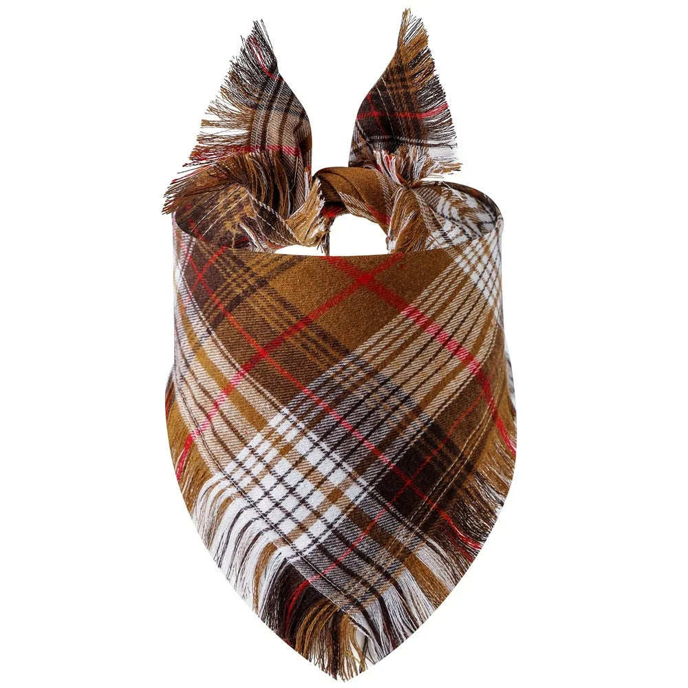 A plaid dog bandana featuring brown, tan, and white colors with fringed edges.