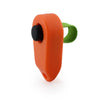 Orange pet training clicker with a black button and a green grip.