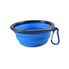 A bright blue collapsible silicone pet travel bowl with a black rim and attached leash.