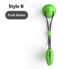 A bright fruit green interactive suction cup tug dog ball with a black cord and grip.